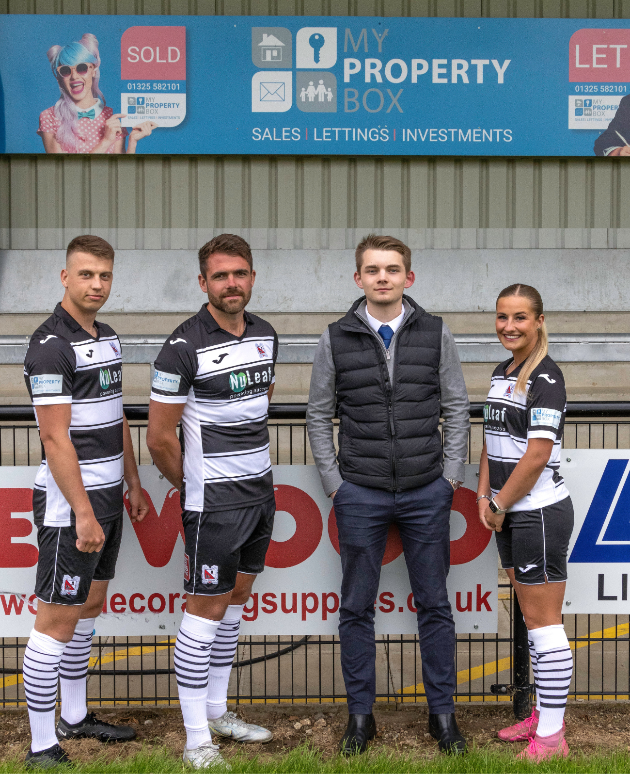 My Property Box's Harry Harrison pictured with Darlington FC players